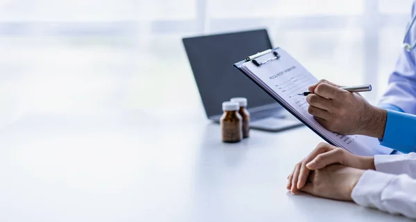 stock image Psychiatrist consulting on women's gynecological diseases, writing prescription clipboard notes, listening to patients received in the clinic hospital.