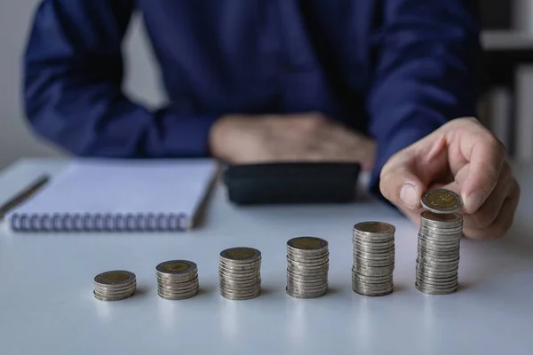 stock image Concepts of financial accounting management in the future, income and expenses, savings and investment management concepts. Key things to consider when planning with stacks of coins