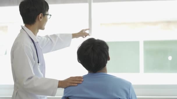 Happy Doctor Visiting Young Male Patient Bring Good News Encouragement — Video