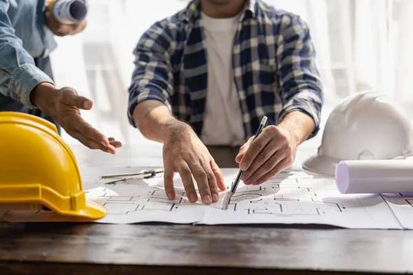 house design architect inspect the house customer-specified projects and according to the model before delivery Engineer in office with blueprints, on-site inspection for architectural plans, construction projects, business construction