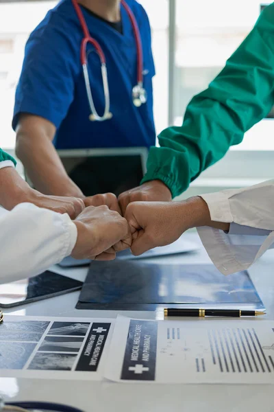 Cooperation and teamwork in the hospital for success and trust in the team. scientific cooperation agreement handshake agreement Innovation and contract research laboratory scientists