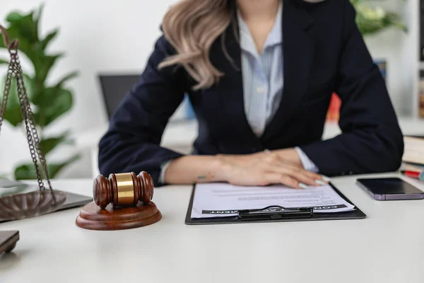 stock image A law firm where justice stands and weighs and judges' perches stand beside justice advice and ideas. Close-up pictures