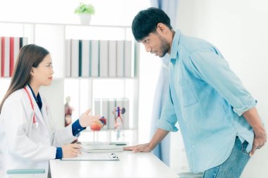 The concept of pain in the anus, inflamed hemorrhoids touching his buttocks, people with diarrhea problems, people with hemorrhoids consulting a doctor.