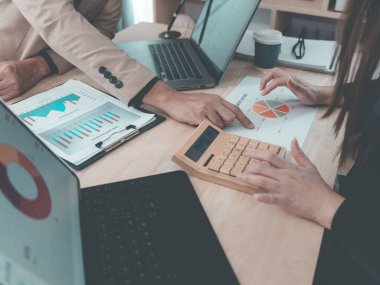 Financial statement analysis team, finance work with smartphones, laptops and tablets with digital marketing media in the form of virtual icons, financial manager meeting.