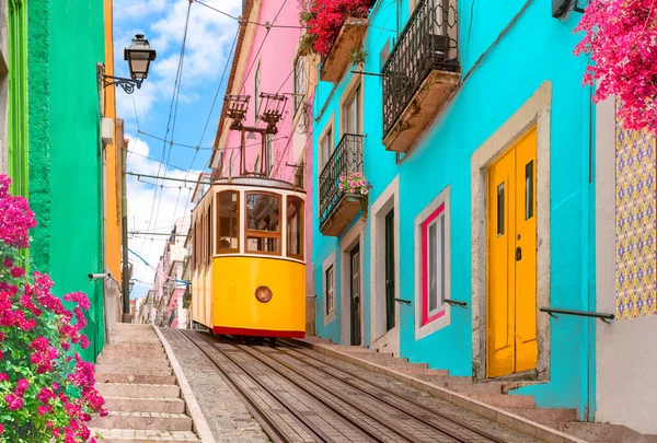 Lisbon, Portugal - Yellow tram on a colorful city street  