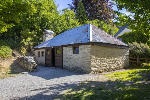 On the banks of Bush Creek, a tributary of the Arrow River, is the partially restored Arrowtown Chinese Settlement