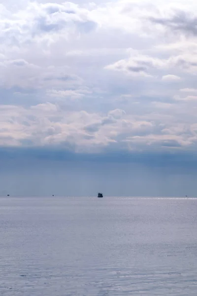 stock image Boat in the middle of the Meditarranean sea during a cloudy day