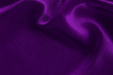 Arka plan ve tasarım için mor kumaş dokusu, güzel buruşmuş ipek ya da keten deseni..