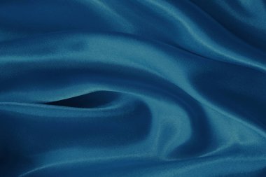 Arkaplan ve tasarım için koyu mavi kumaş dokusu, güzel buruşmuş ipek ya da keten deseni..
