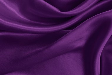 Arka plan ve tasarım için mor kumaş dokusu, güzel buruşmuş ipek ya da keten deseni..