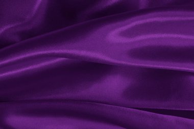 Purple fabric cloth texture for background and design art work, beautiful crumpled pattern of silk or linen.	