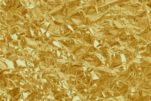 金箔の光沢のある質感 背景とデザインのための抽象的な黄色の包装紙作品 — ストック写真
