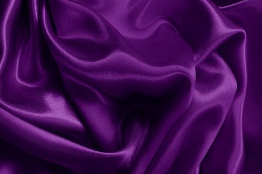 Arka plan ve tasarım için mor kumaş dokusu, güzel buruşmuş ipek ya da keten deseni..