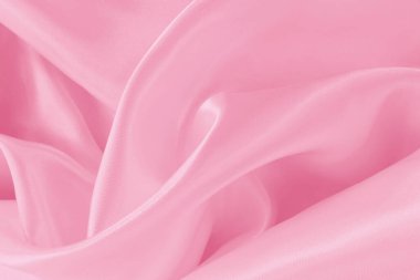 Arkaplan ve tasarım için pembe kumaş dokusu, güzel buruşuk ipek ya da keten deseni.
