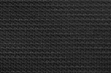 Pürüzsüz desenli siyah kauçuk arkaplan.