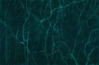 Koyu yeşil mermer desenli arka plan, yüksek çözünürlüklü, doğal taşların üst görüntüsü lüks ve pürüzsüz parıltı desenli..