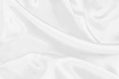 Arkaplan ve tasarım için beyaz kumaş kumaş dokusu, güzel buruşmuş ipek ya da keten deseni.