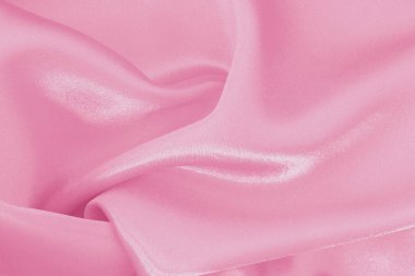 Arkaplan ve tasarım için pembe kumaş dokusu, güzel buruşuk ipek ya da keten deseni.