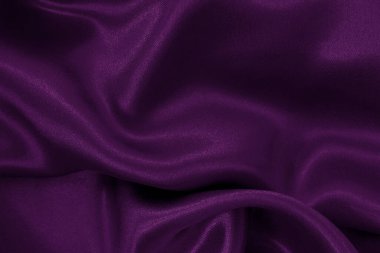 Arka plan ve tasarım için mor kumaş dokusu, güzel buruşmuş ipek ya da keten deseni..