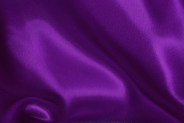 Arka plan ve tasarım için mor kumaş dokusu, güzel buruşmuş ipek ya da keten deseni..