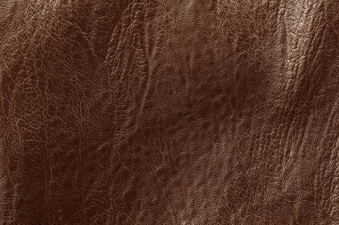 Koyu kahverengi deri desenli ve yüksek çözünürlüklü..