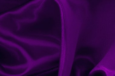 Purple fabric cloth texture for background and design art work, beautiful crumpled pattern of silk or linen.	