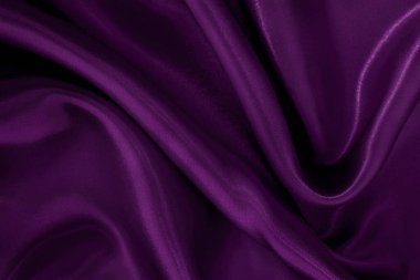 Arka plan ve tasarım için mor kumaş dokusu, güzel buruşmuş ipek ya da keten deseni..