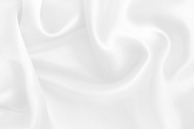 Arkaplan ve tasarım için beyaz kumaş kumaş dokusu, güzel buruşmuş ipek ya da keten deseni.