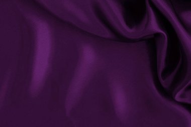 Arka plan ve tasarım için mor kumaş dokusu, güzel buruşmuş ipek ya da keten deseni..