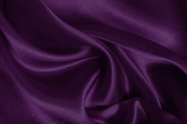 Arka plan ve tasarım için mor kumaş dokusu, güzel buruşmuş ipek ya da keten deseni..