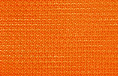 Pürüzsüz desenli turuncu kauçuk arkaplan.