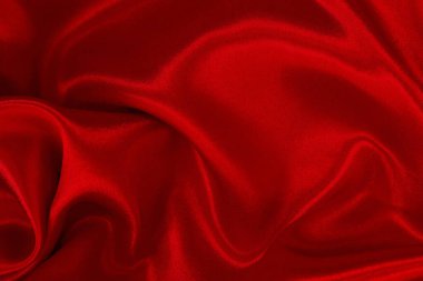 Arka plan ve tasarım için kırmızı kumaş dokusu, güzel buruşmuş ipek ya da keten deseni.
