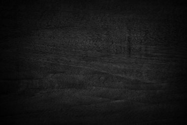 Siyah ahşap duvar arka planı, koyu ağaç kabuğu dokusu eski doğal desenli tasarım sanatı çalışması, tahıl kerestesinin üst görüntüsü..