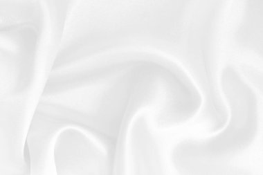 Arkaplan ve tasarım için beyaz kumaş kumaş dokusu, güzel buruşmuş ipek ya da keten deseni.