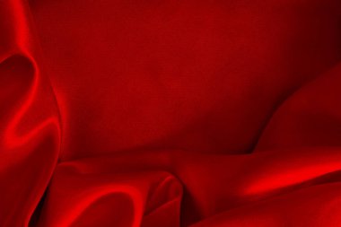 Arka plan ve tasarım için kırmızı kumaş dokusu, güzel buruşmuş ipek ya da keten deseni.