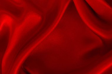 Arka plan ve tasarım için koyu kırmızı kumaş dokusu, güzel buruşmuş ipek ya da keten deseni..