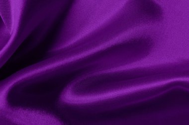 Arka plan ve tasarım için mor kumaş dokusu, güzel buruşmuş ipek ya da keten deseni..