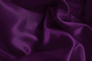 Arka plan ve tasarım için mor kumaş dokusu, güzel buruşmuş ipek ya da keten deseni..