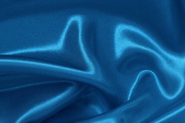 Arka plan ve tasarım için mavi kumaş dokusu, güzel buruşuk ipek ya da keten deseni.