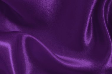 Arka plan ve tasarım için mor kumaş dokusu, güzel buruşmuş ipek ya da keten deseni..
