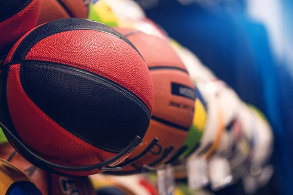 Basketball ball on the shelf in the store close-up