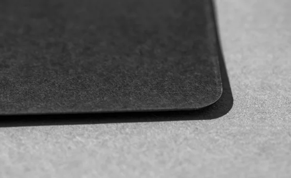 Black card in the gray background. Calling card template for company branding name, phone number, email address.