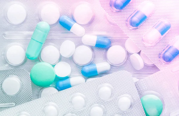 stock image Colorful pills and capsules background close up, copy space, selective focus, medical concept.