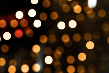 Soyut hareket arkaplanı Bokeh ile Parıldayan Parçacıklar