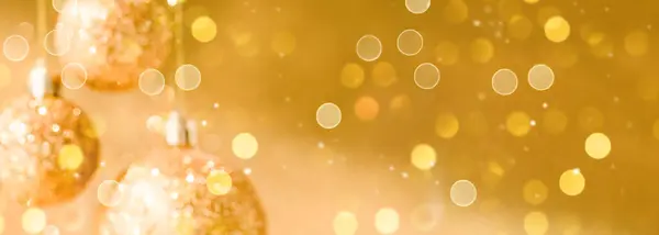 Gold glass balls for Christmas Background.