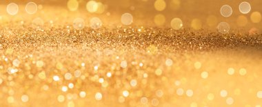 Altın Noel parçacıkları ışıkları. Tatil kutlaması ve yeni yıl. Altın ışıklar arkaplanı.