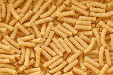 Chaotic Pile of Uncooked Rigatoni Pasta Background. clipart