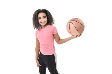 A Studio shot of young girl, basketball player over white background clipart