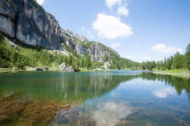 Federa alpine lake landscape, italian dolomites panorama. Mountain lake panorama