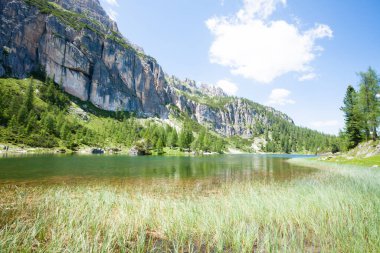 Federa alpine lake landscape, italian dolomites panorama. Mountain lake panorama